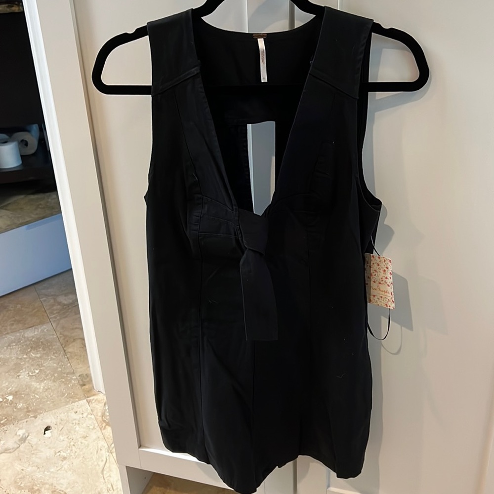 Free people black romper w/tie front and open back